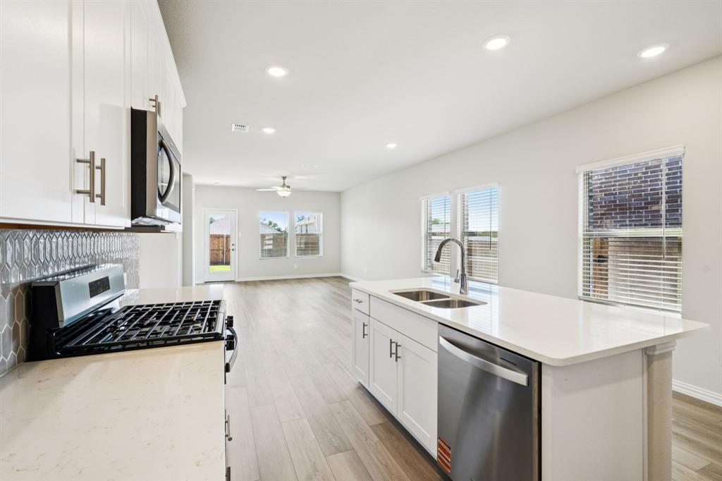 1717 Arches Road Anna, TX 75409 - Photo 4 of 29 Photo is not of the actual home, but is an inspirational photo of builder’s model home and may depict options, furnishings, and/or decorator features that are not included.