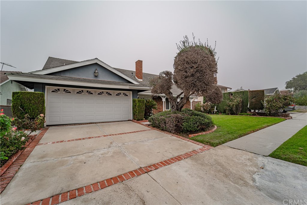 23605 Sunset Crossing Road Diamond Bar, CA 91765 - Photo 1 of 1 front view of house with a yard and potted plants