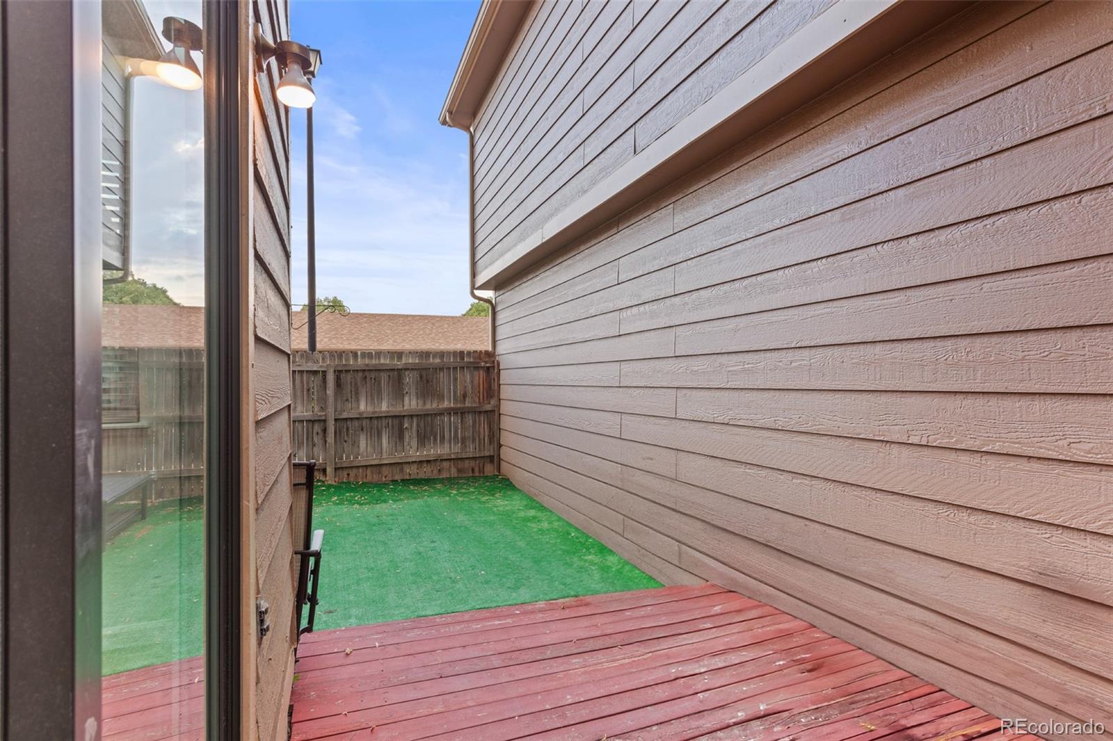 1720 South Quintero Way Aurora, CO 80017 - Photo 18 of 21 a view of a backyard of the house