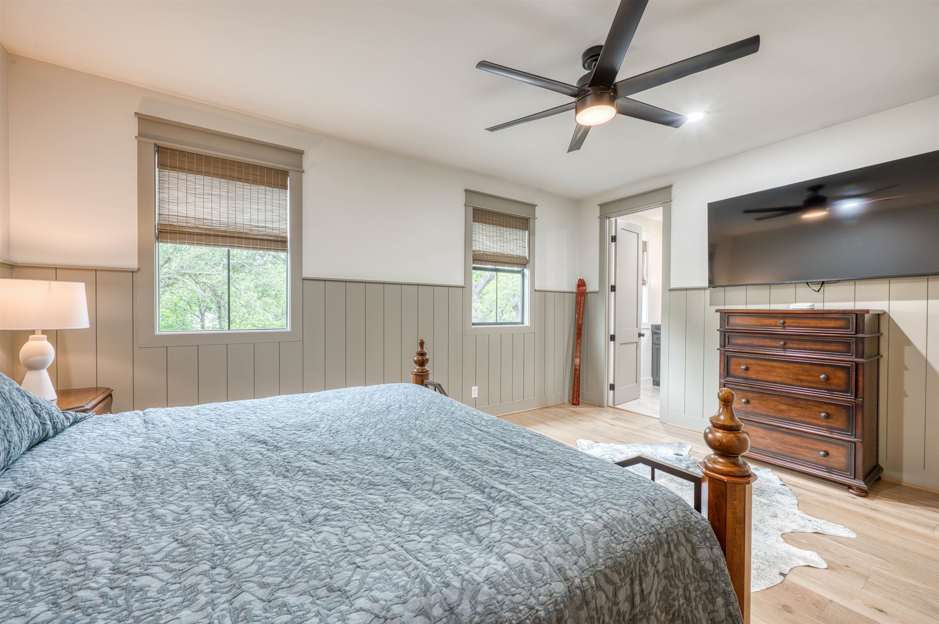 2001 Granite Cove Road Kingsland, TX 78639 - Photo 25 of 42 a bedroom with a bed and a flat screen tv