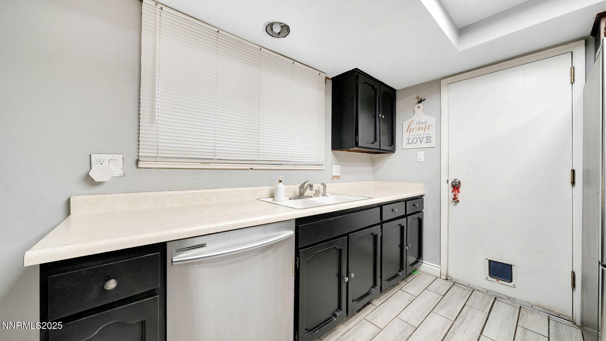 7640 Bluestone Drive Reno, NV 89511 - Photo 26 of 30 a bathroom with a sink and a mirror