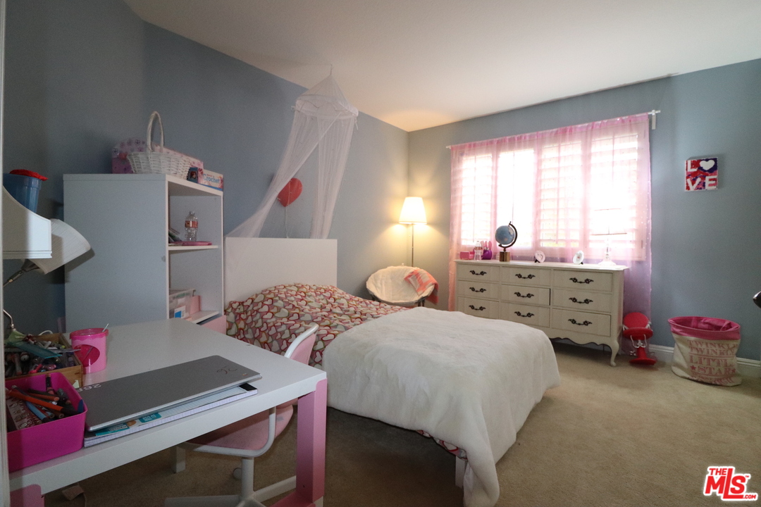 2 Montage Irvine, CA 92614 - Photo 13 of 32 a bedroom with a bed and a window