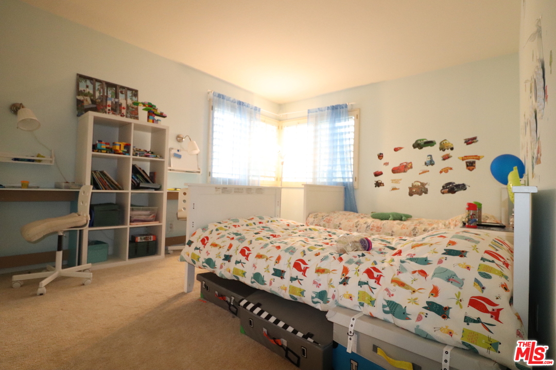 2 Montage Irvine, CA 92614 - Photo 15 of 32 a bedroom with a bed and a window