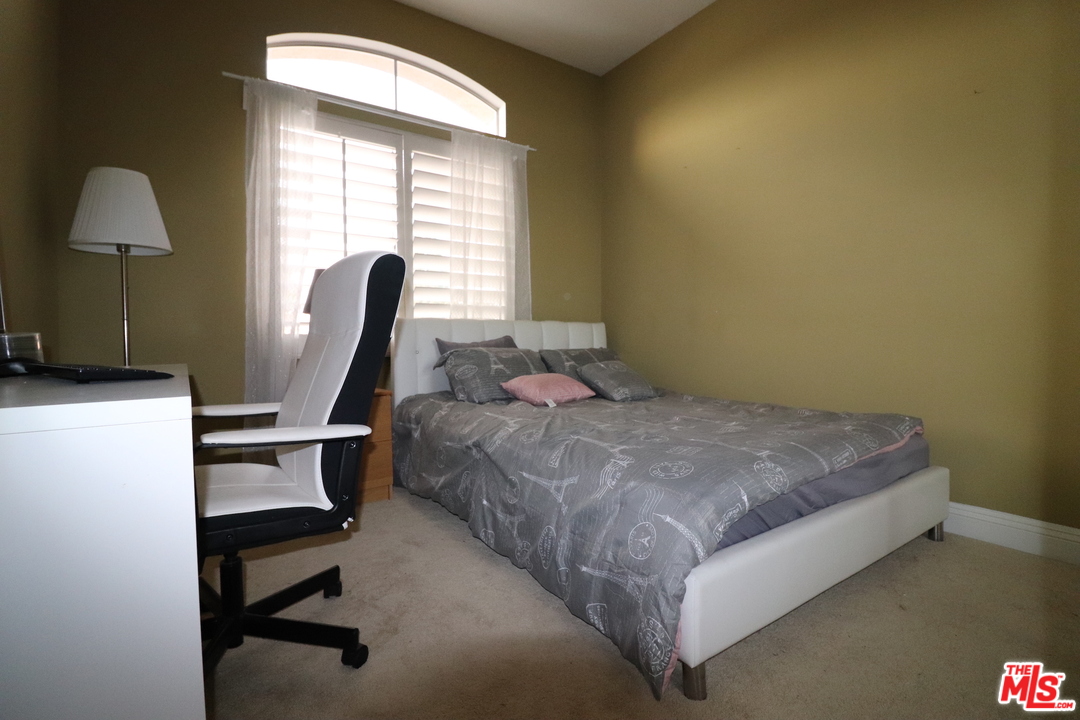 2 Montage Irvine, CA 92614 - Photo 16 of 32 a bedroom with a bed and a desk