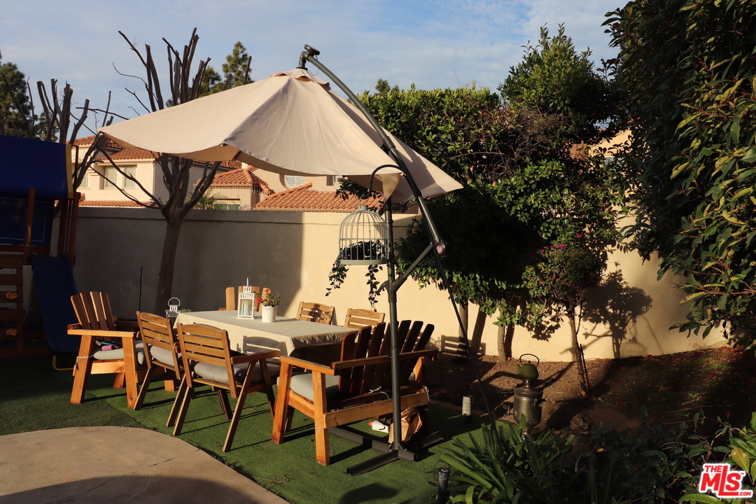 2 Montage Irvine, CA 92614 - Photo 27 of 32 a view of a patio with table and chairs and potted plants