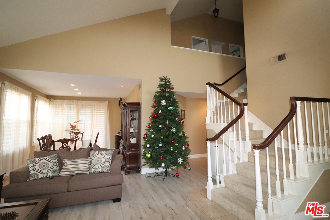 2 Montage Irvine, CA 92614 - Photo 6 of 32 a living room with furniture or wooden floor and a chandelier