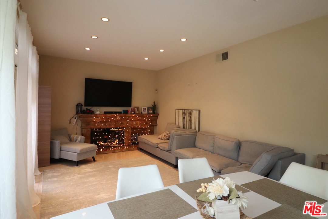 2 Montage Irvine, CA 92614 - Photo 8 of 32 a living room with furniture and a flat screen tv