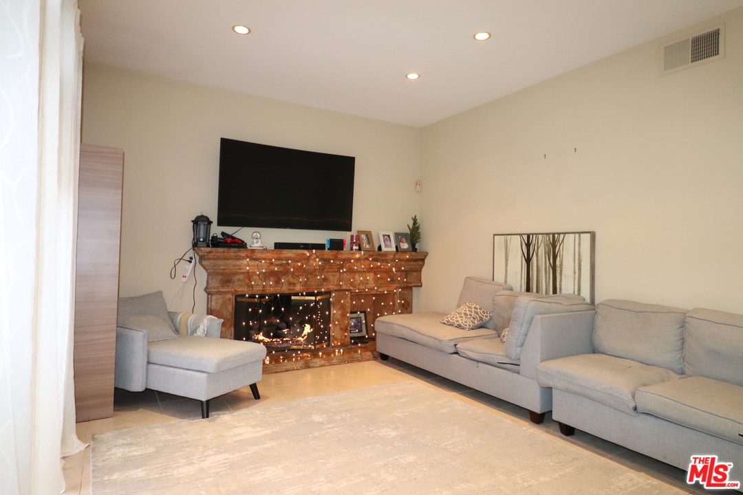 2 Montage Irvine, CA 92614 - Photo 9 of 32 a living room with furniture and a flat screen tv