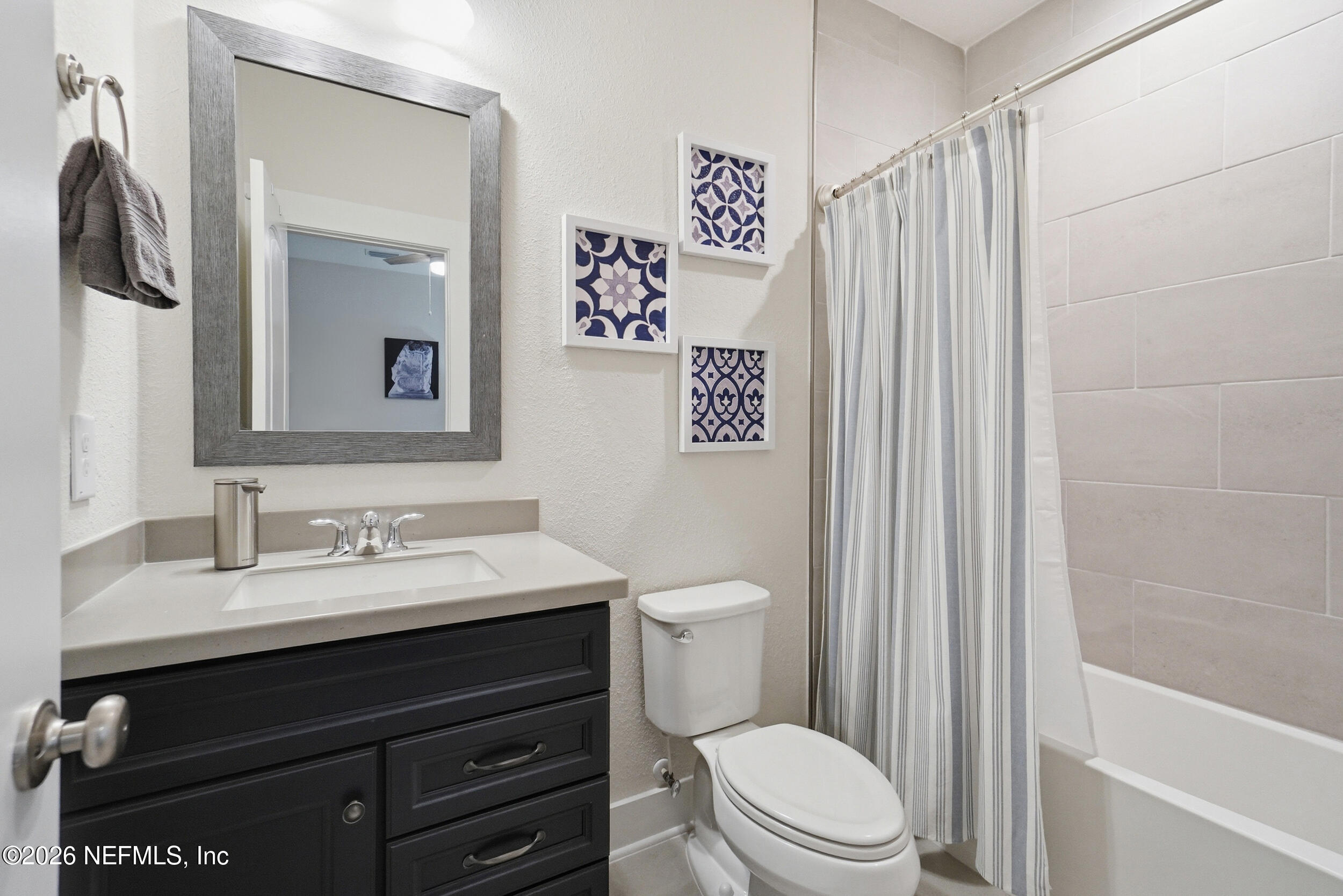 34 Red Rock Lane St. Johns, FL 32259 - Photo 41 of 71 a bathroom with a sink vanity mirror and toilet