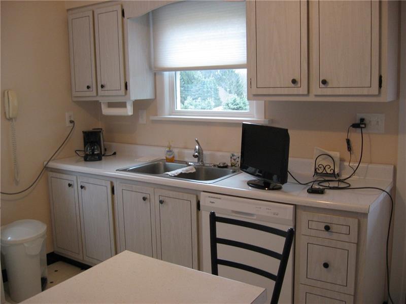 1005 Wible Run Road Pittsburgh, PA 15209 - Photo 8 of 15 Nicely equipped kitchen with all appliances, complete with breakfast bar