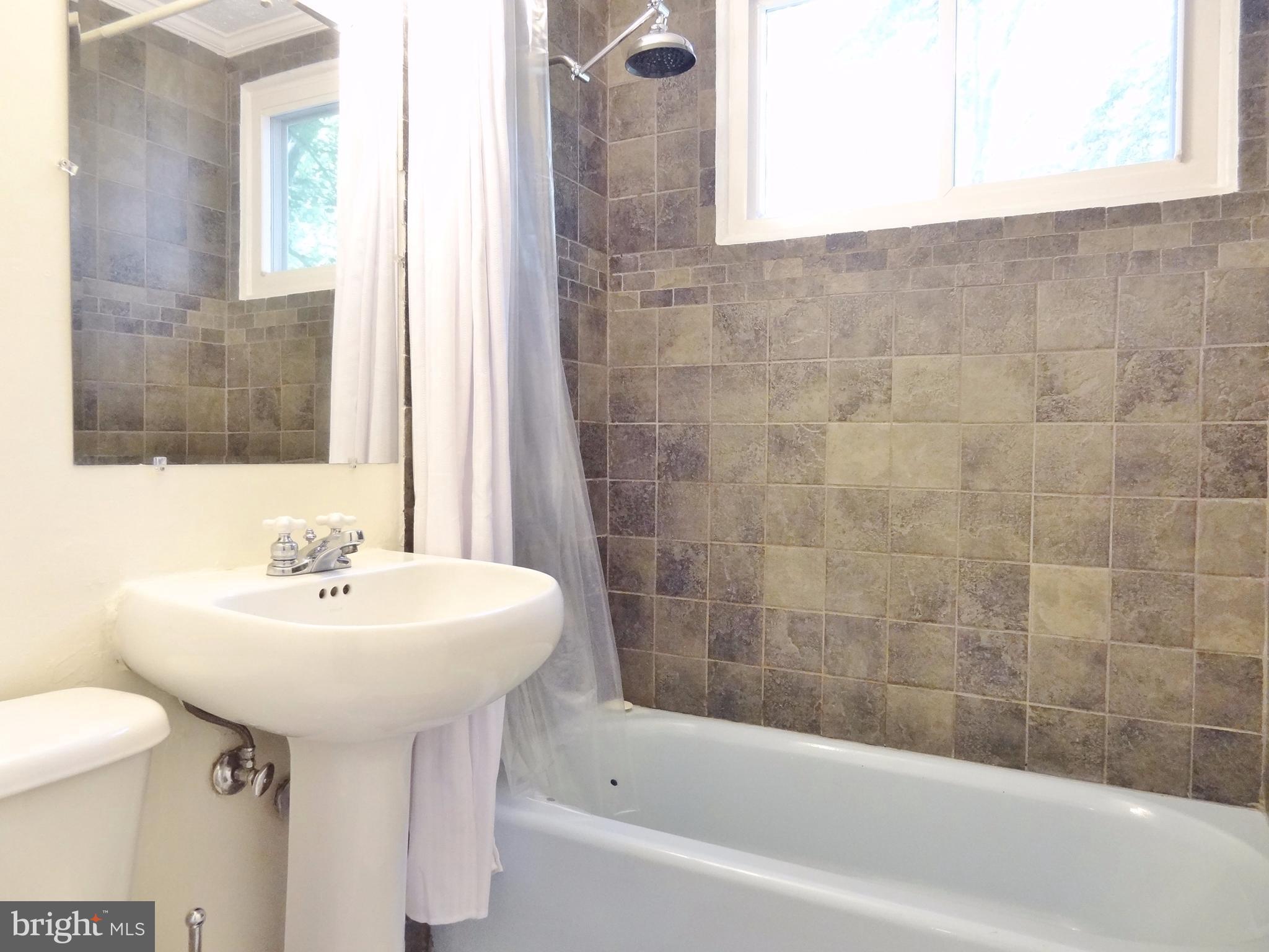 11 Hillside Road, Unit E Greenbelt, MD 20770 - Photo 3 of 11 Ceramic-Tiled Bath