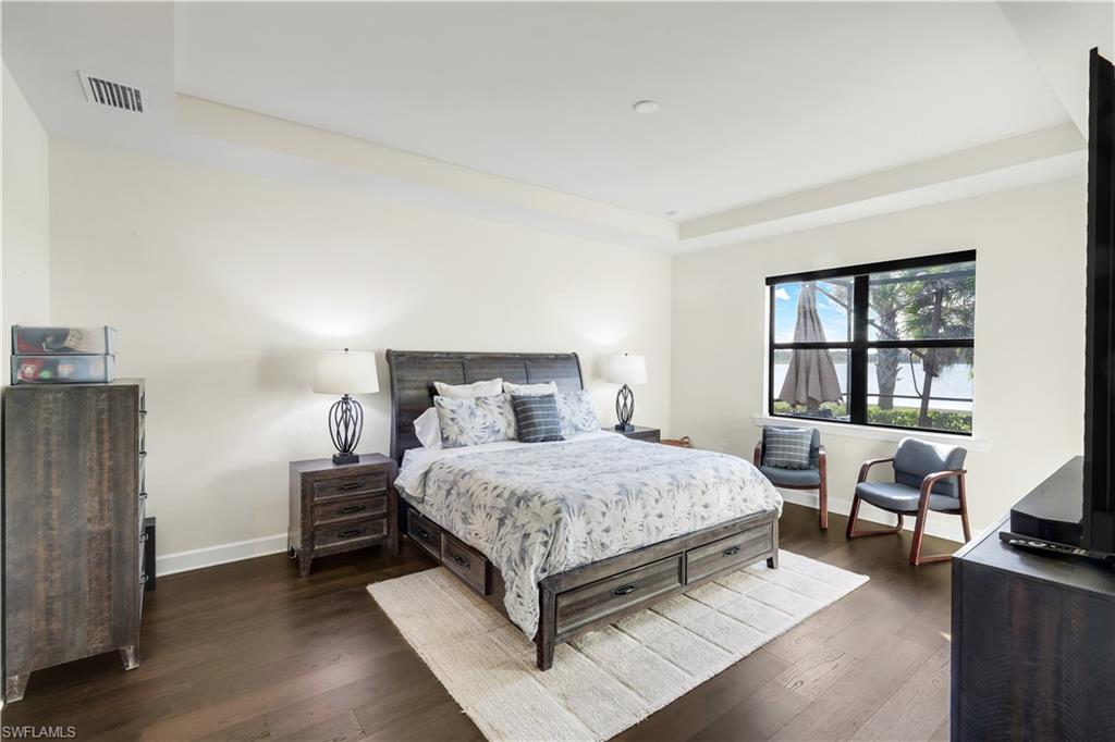 19696 Aqua View Lane Fort Myers, FL 33913 - Photo 17 of 49 a bedroom with a bed and a window