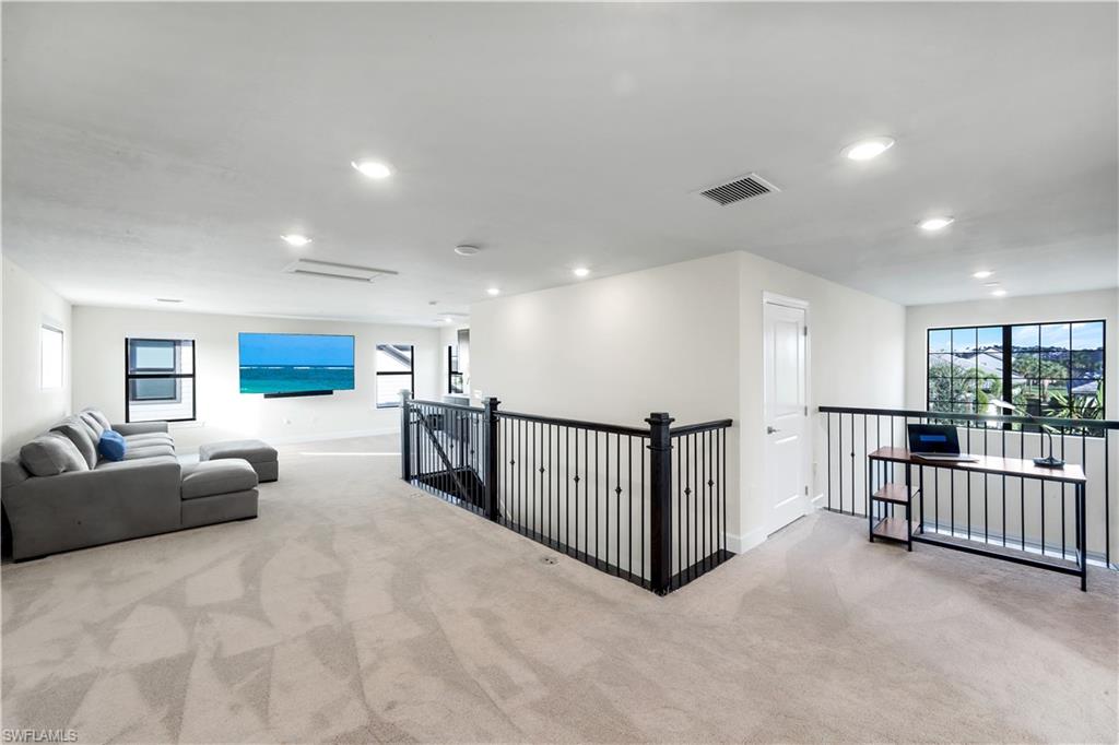 19696 Aqua View Lane Fort Myers, FL 33913 - Photo 27 of 49 a view of a livingroom with furniture and windows