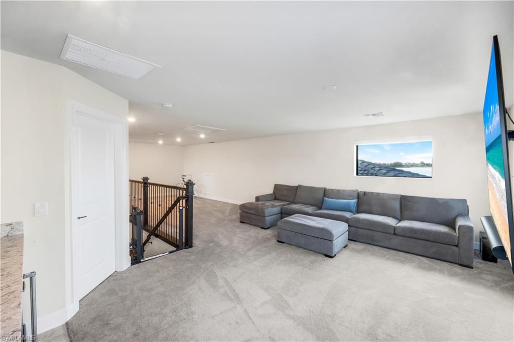 19696 Aqua View Lane Fort Myers, FL 33913 - Photo 28 of 49 a living room with furniture and a couch