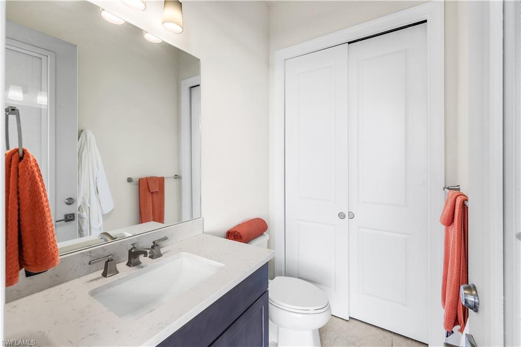 19696 Aqua View Lane Fort Myers, FL 33913 - Photo 32 of 49 a bathroom with a sink toilet and shower
