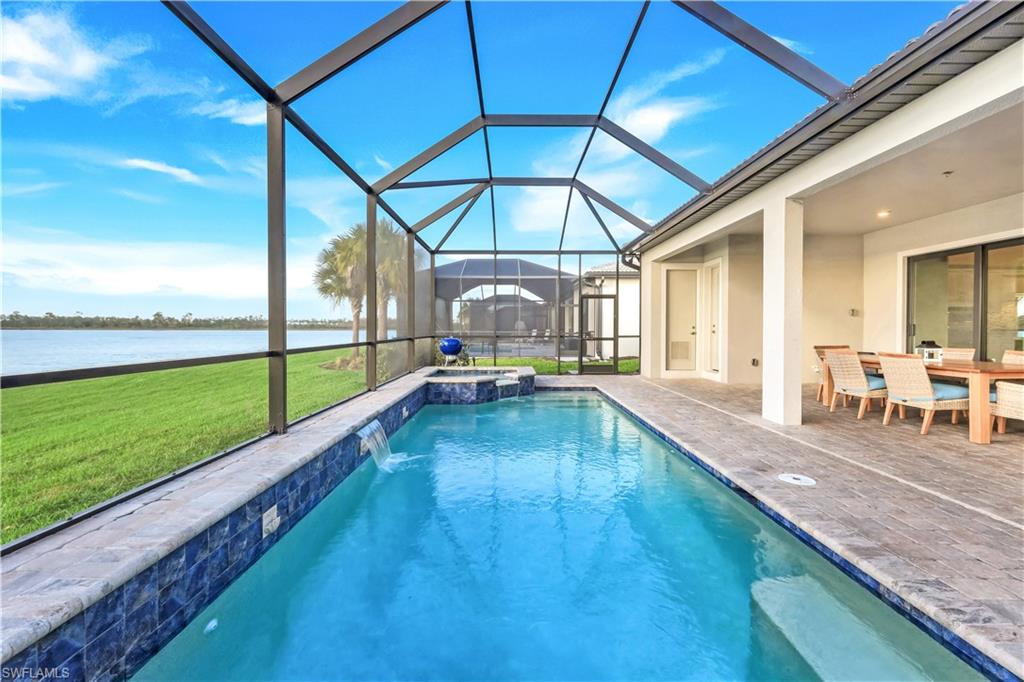 19696 Aqua View Lane Fort Myers, FL 33913 - Photo 35 of 49 a view of swimming pool with a patio