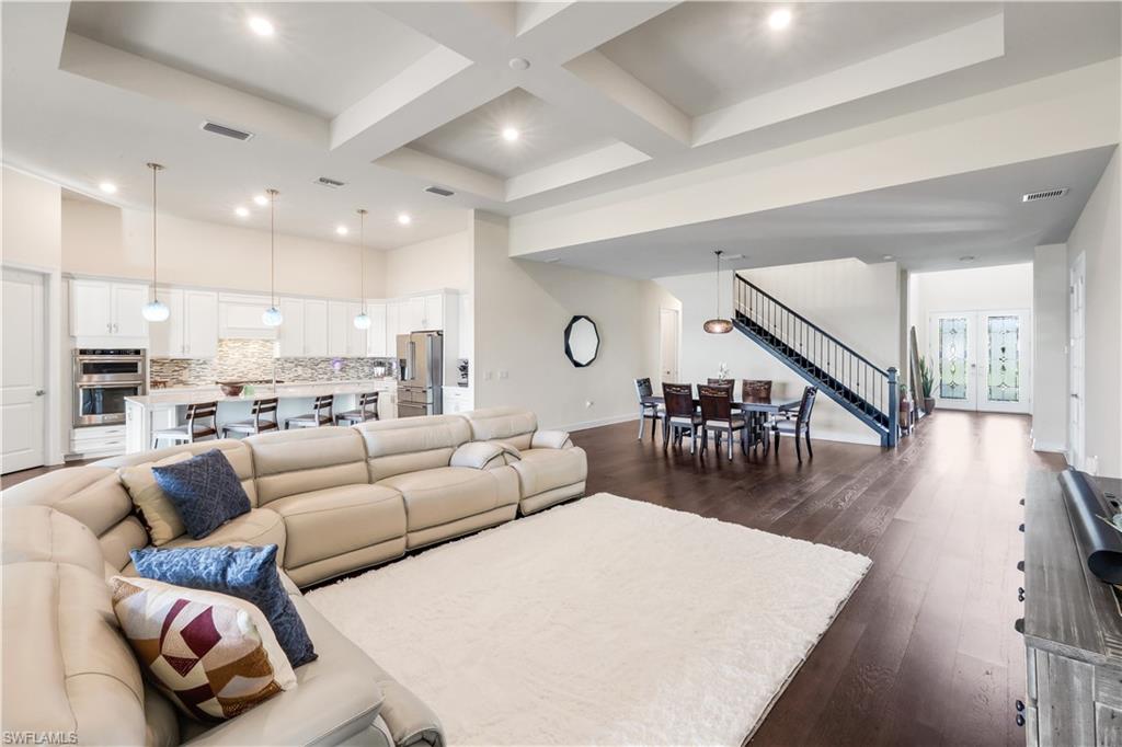 19696 Aqua View Lane Fort Myers, FL 33913 - Photo 8 of 49 a living room with furniture and wooden floor