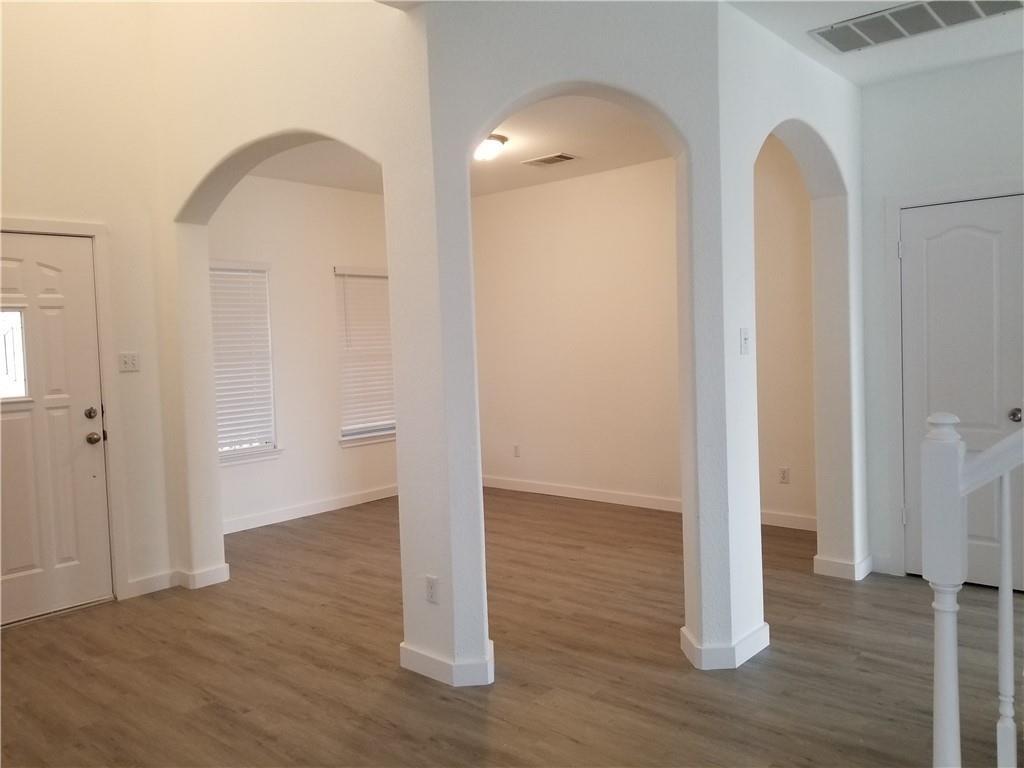 1327 Solitaire Round Rock, TX 78665 - Photo 2 of 9 a view of room with wooden floor