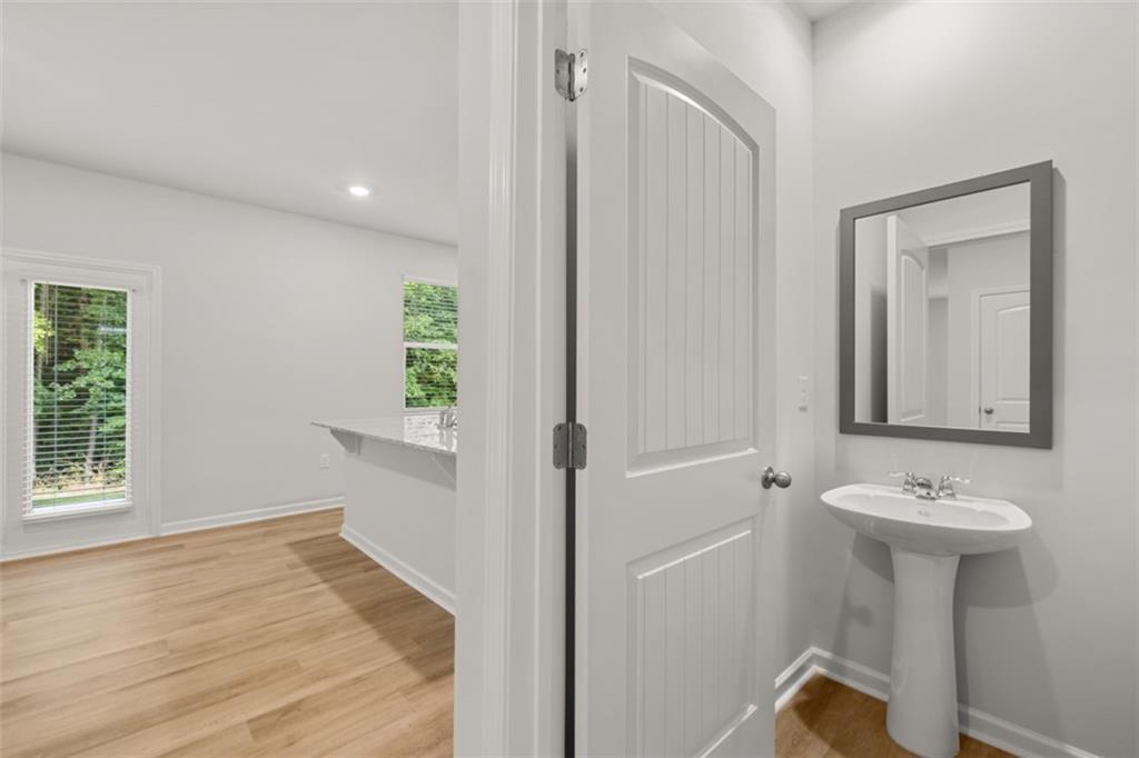 503 Oak View Lane Dallas, GA 30157 - Photo 11 of 42 a bathroom with a sink and mirror