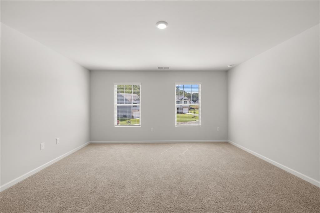 503 Oak View Lane Dallas, GA 30157 - Photo 23 of 42 an empty room with windows