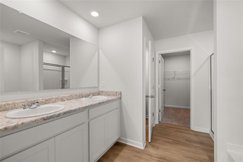 503 Oak View Lane Dallas, GA 30157 - Photo 25 of 42 a bathroom with a granite countertop sink and a mirror