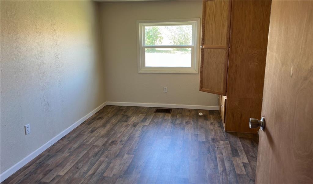 308 Sgros Road Rural Valley, PA 16249 - Photo 14 of 25 a view of a room with wooden floor and a window