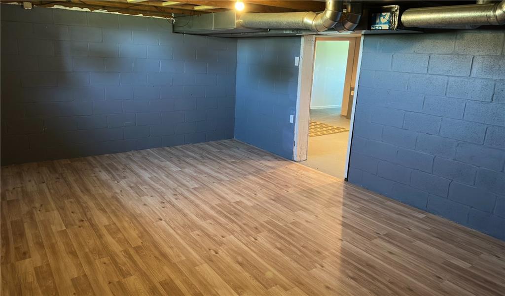 308 Sgros Road Rural Valley, PA 16249 - Photo 20 of 25 a view of empty room with wooden floor