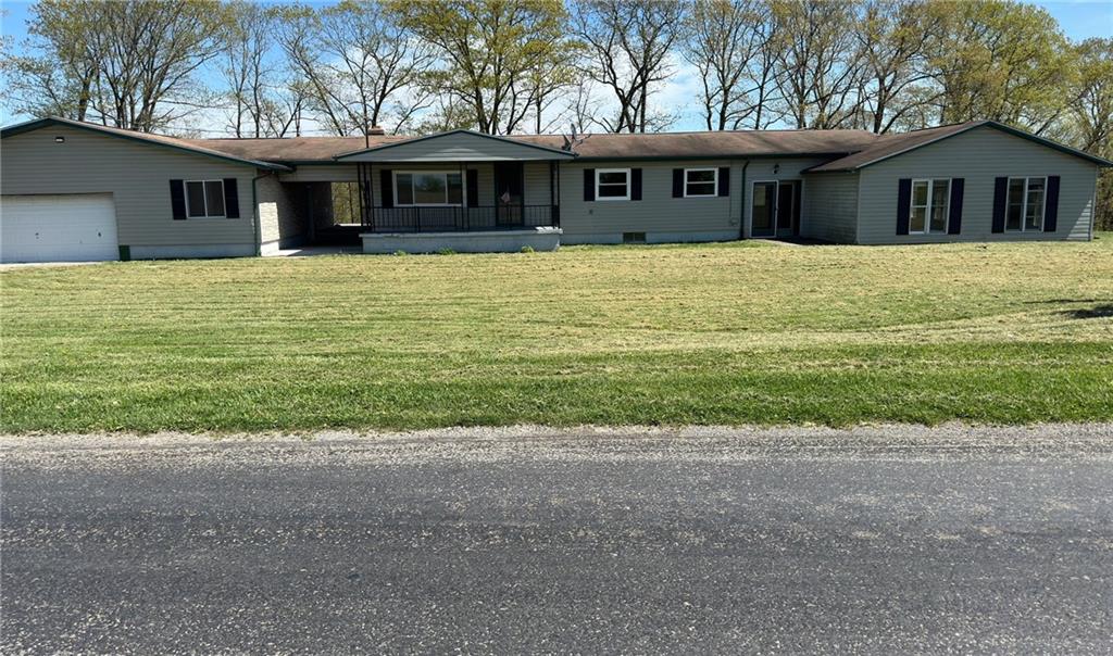 308 Sgros Road Rural Valley, PA 16249 - Photo 2 of 25 a front view of a house with a yard
