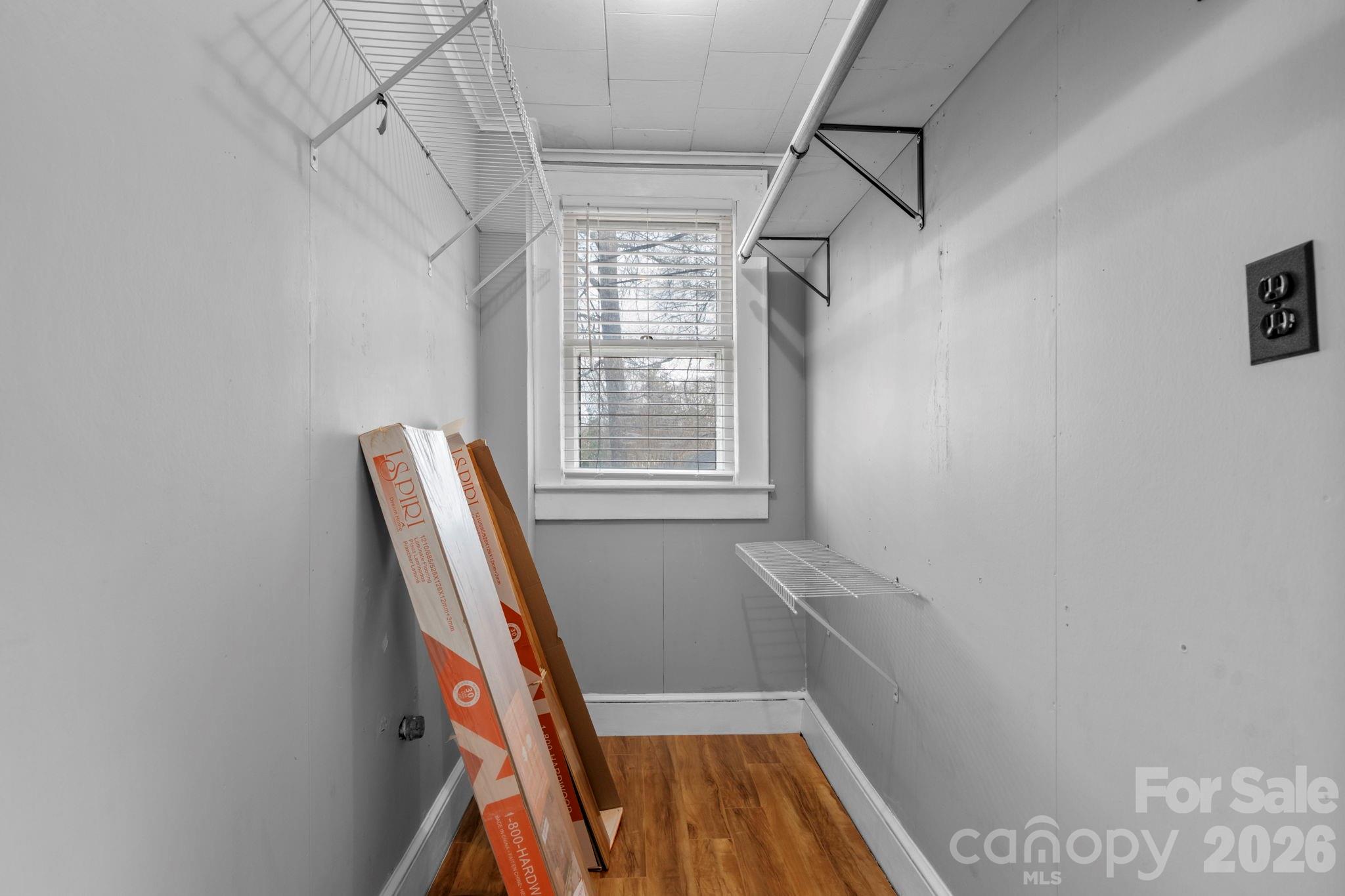 925 12th Avenue Northwest Hickory, NC 28601 - Photo 11 of 19 a view of room with window and wooden floor