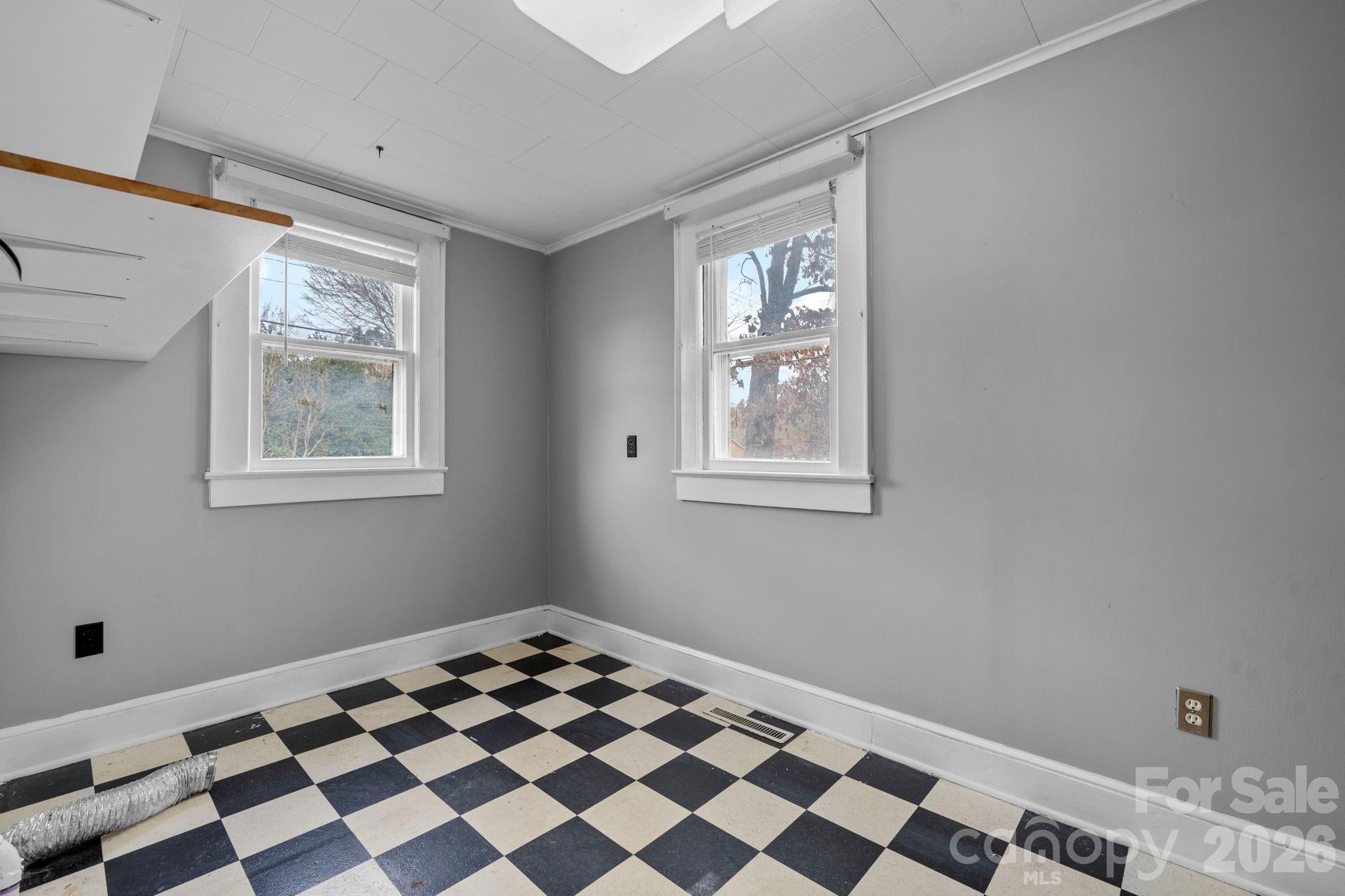 925 12th Avenue Northwest Hickory, NC 28601 - Photo 13 of 19 a bedroom with a bed and a window