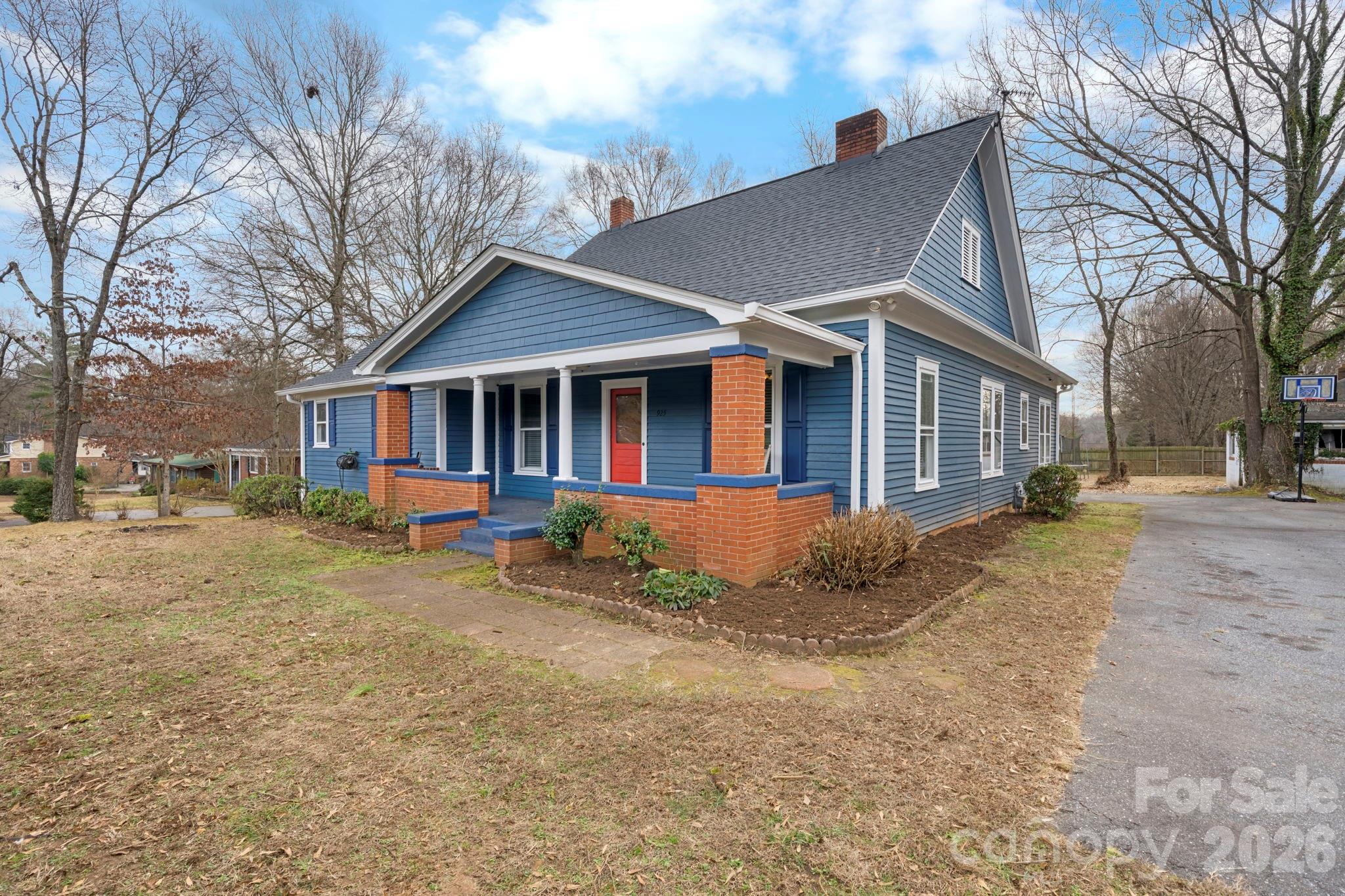 925 12th Avenue Northwest Hickory, NC 28601 - Photo 16 of 19 a view of a yard in front of house