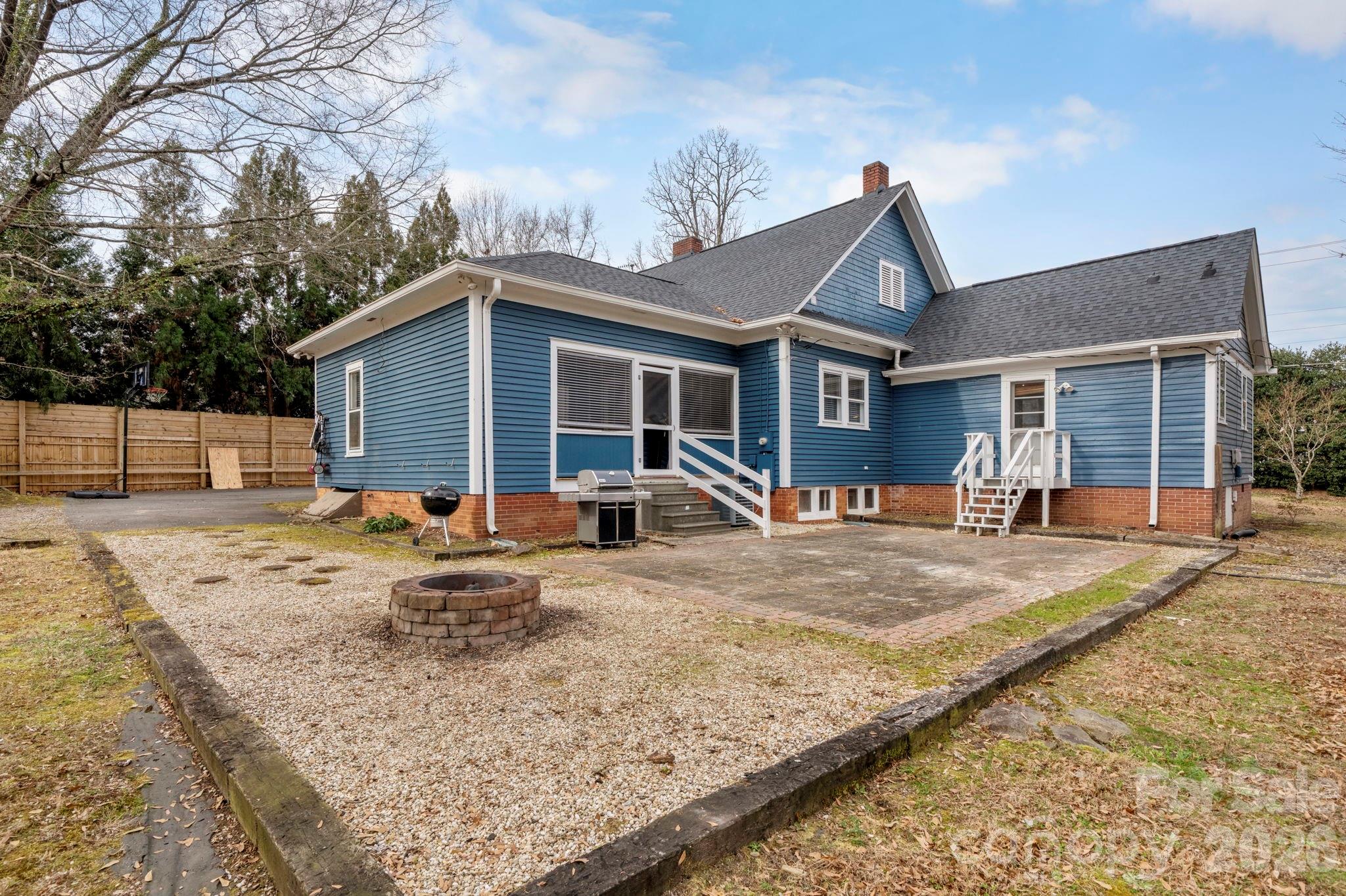 925 12th Avenue Northwest Hickory, NC 28601 - Photo 18 of 19 a view of a house with snow on the side of the road