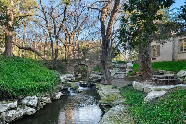 a backyard of a house with lots of green space