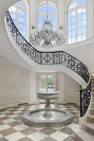 a view of hall way with furniture