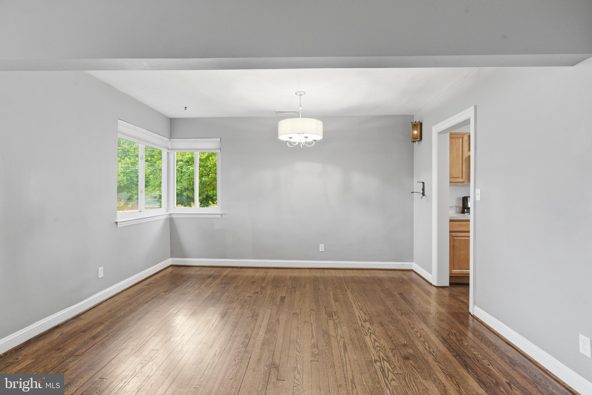 6801 Adelphi Road University Park, MD 20782 - Photo 4 of 26 Hardwood flooring throughout the home.
