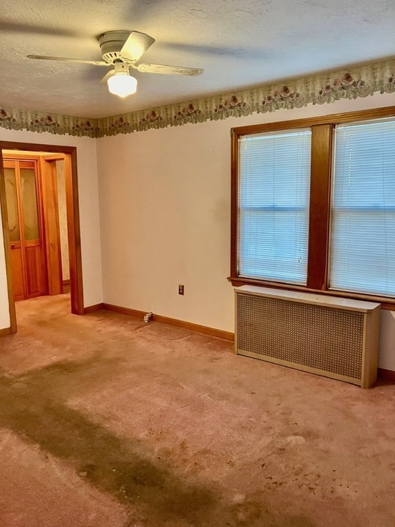 23 Carver Street Worcester, MA 01604 - Photo 12 of 27 a view of an empty room with a window