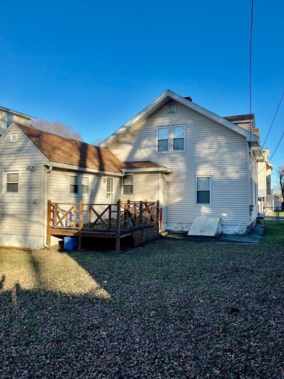23 Carver Street Worcester, MA 01604 - Photo 3 of 27 a view of a house with backyard