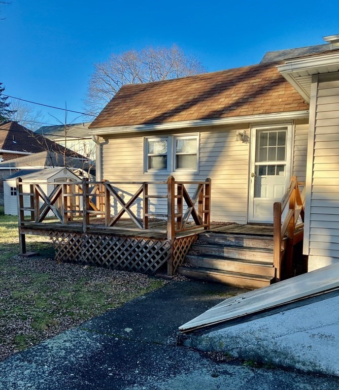 23 Carver Street Worcester, MA 01604 - Photo 4 of 27 front view of a house with a yard