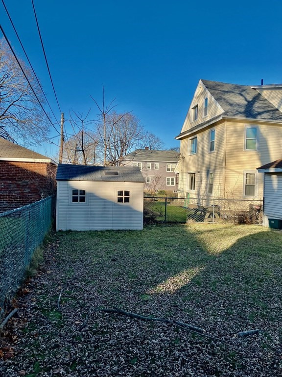 23 Carver Street Worcester, MA 01604 - Photo 6 of 27 a view of a house with a yard