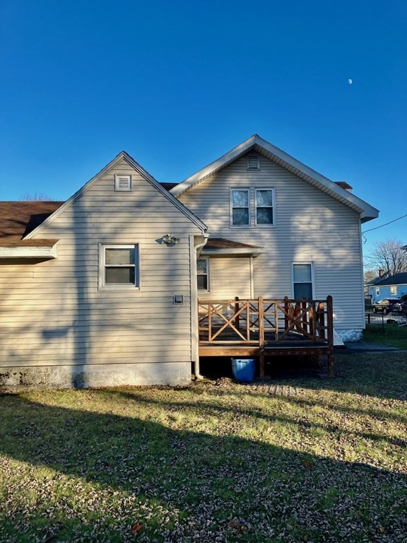 23 Carver Street Worcester, MA 01604 - Photo 7 of 27 a front view of a house with a yard