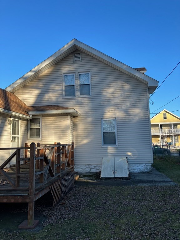 23 Carver Street Worcester, MA 01604 - Photo 9 of 27 a front view of a house with a yard