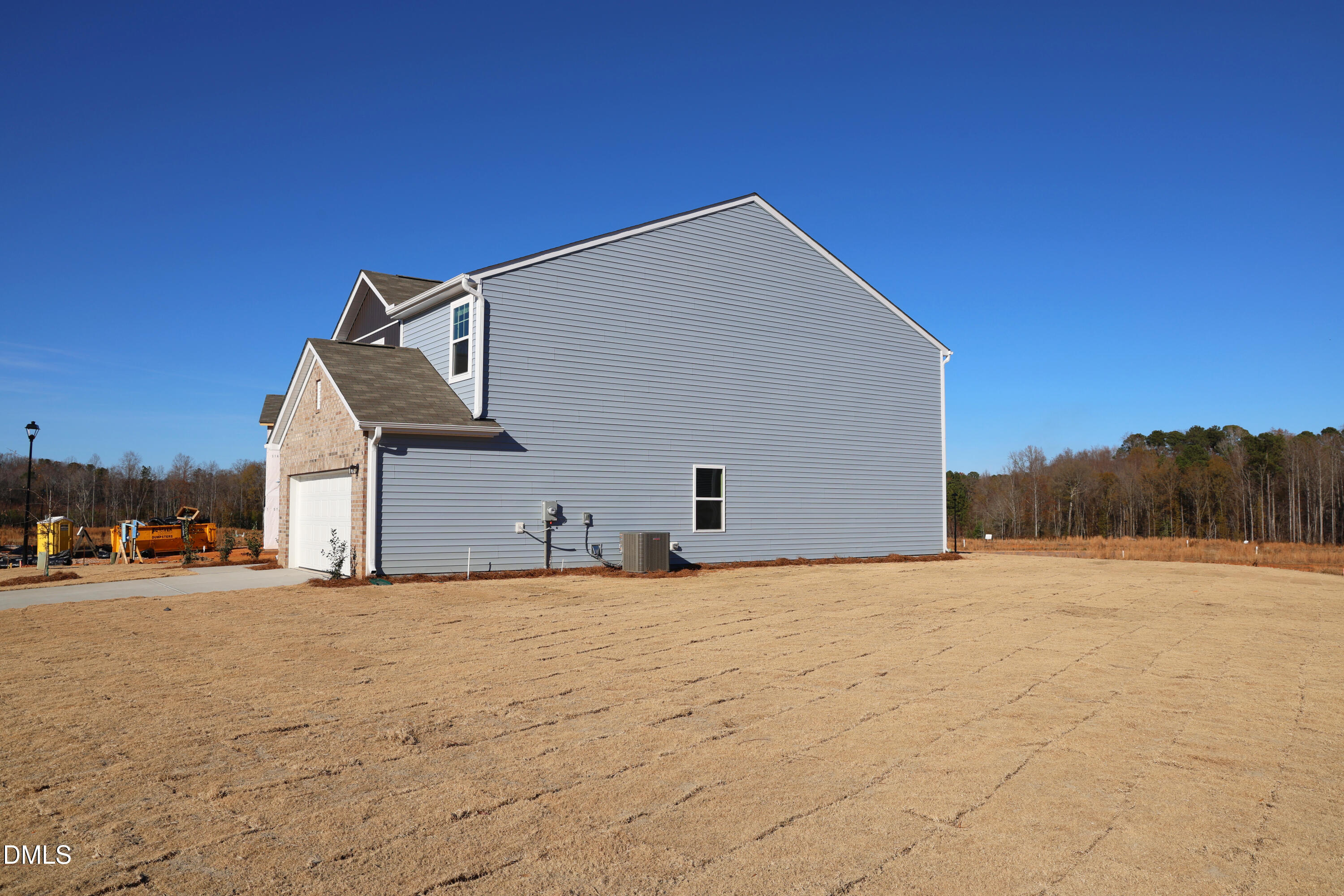 987 Bombardier Alley Spring Hope, NC 27882 - Photo 4 of 23 a view of the house with a yard