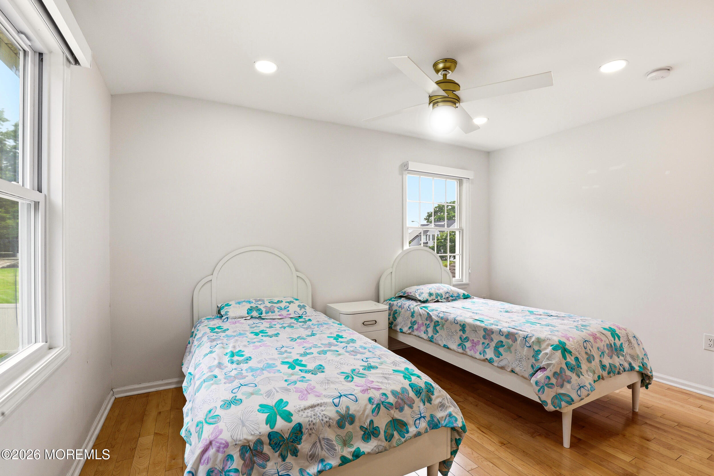2055 MacKenzie Road Toms River, NJ 08755 - Photo 30 of 56 a bedroom with two beds and a window