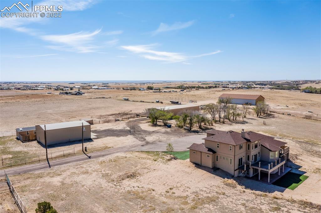 14335 Jones Road Peyton, CO 80831 - Photo 21 of 49 a view of a lake with outdoor seating space