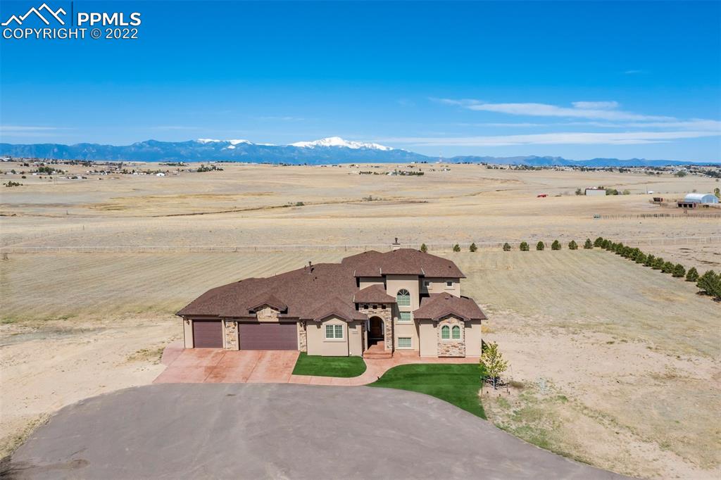 14335 Jones Road Peyton, CO 80831 - Photo 22 of 49 a view of a big room with an ocean beach