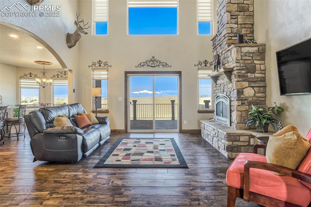14335 Jones Road Peyton, CO 80831 - Photo 23 of 49 a living room with furniture rug and window