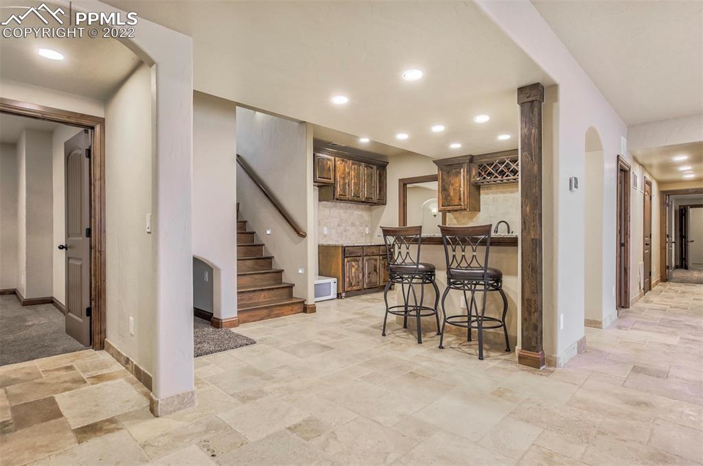 14335 Jones Road Peyton, CO 80831 - Photo 40 of 49 a view of a hallway with furniture and entryway