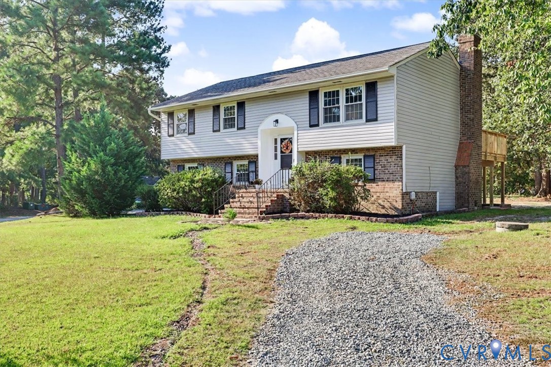 9737 Graves Road Petersburg, VA 23803 - Photo 2 of 41 Two-story residence featuring a brick and siding e