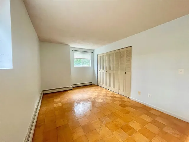 an empty room with window