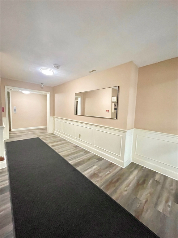 195 Independence Avenue, Unit 118 Quincy, MA 02169 - Photo 14 of 15 a view of an empty room and window